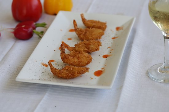 Original Benjamin’s Calabash Seafood signature dishes Original Benjamin 's Calabash
Crab Legs
Coconut Shrimp